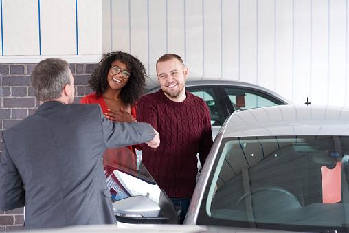 Couple buying car